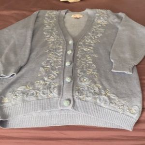 Jocelyn Smith light blue and silver sweater